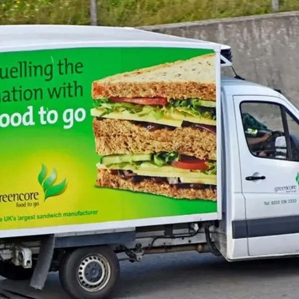 Truck with sandwich advertisement on the side.