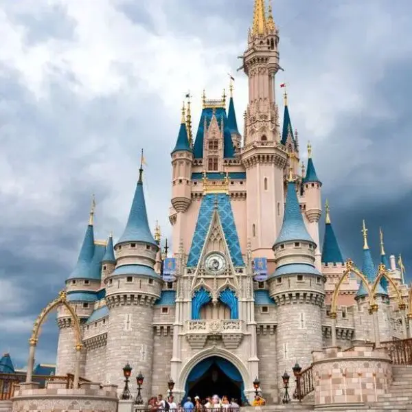 Fairy tale castle under a cloudy sky.