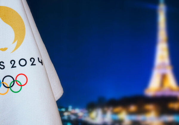 Paris 2024 Olympics logo, Eiffel Tower background.