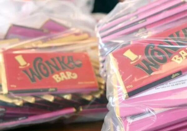Stacks of Wonka Bars in plastic bags.